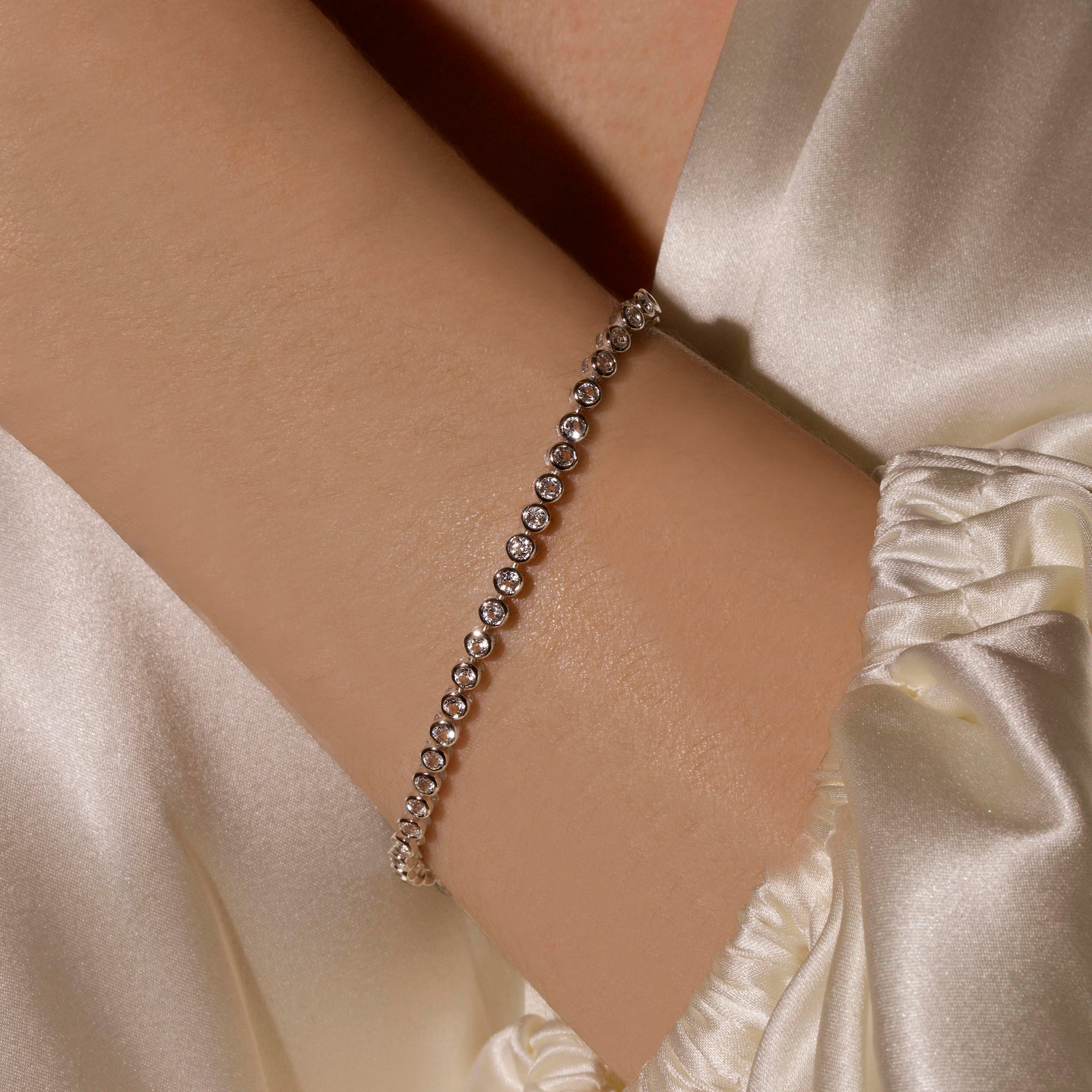 White topaz tennis bracelet discount