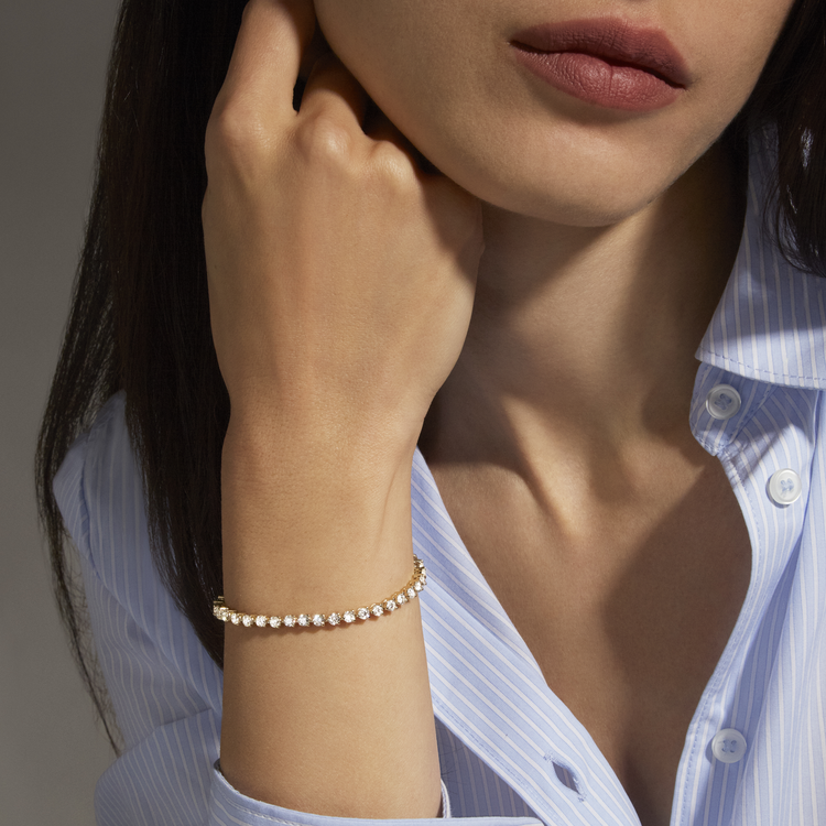 Image of 14K Yellow Gold 4-5 CTW Lab-Created Tennis Bracelet on Models Arm