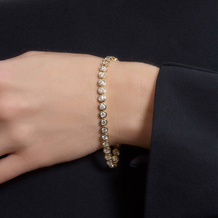 Image of 14K Yellow Gold 5-6 CTW Lab-Created Bubble Up Diamond Tennis Bracelet on Models Arm
