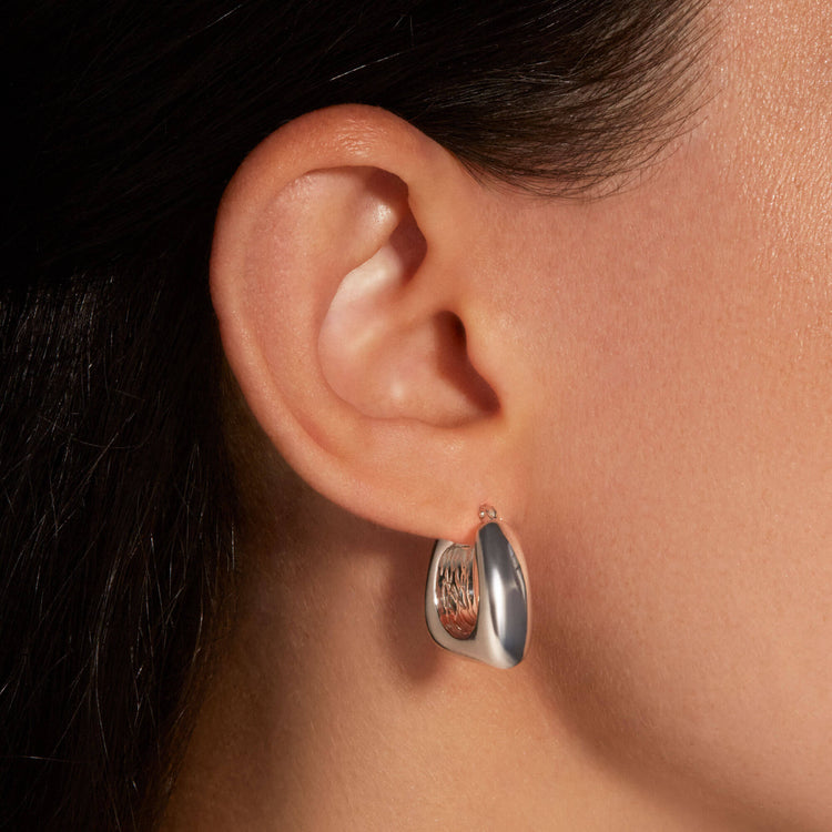 Image of Sterling Silver All Angles Silver Hoops on Models Ear