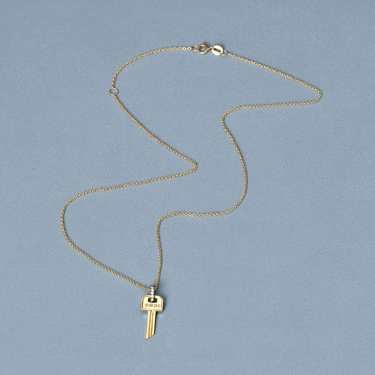 Stone and Strand 10K Yellow Gold Almost Forever Pave Key Necklace Editorial Image