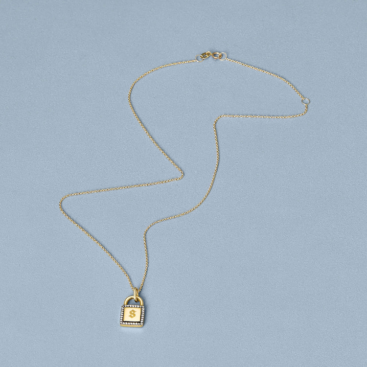 Stone and Strand 10K Yellow Gold Almost Forever Pave Lock Necklace Editorial Image