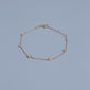 Stone and Strand 14K Yellow Gold Ambroeus Diamond Station Bracelet Editorial Image