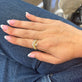 Model wearing The Joan Ring with solid gold Stone and Strand jewelry