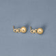 Stone and Strand 14K Yellow Gold Ball Drop Earrings Editorial Image