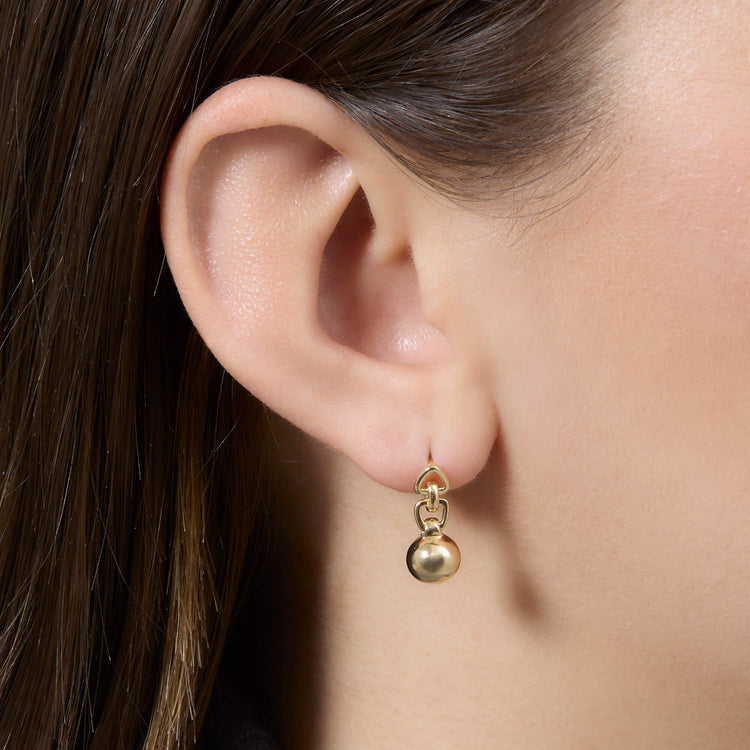 Image of 14K Yellow Gold Ball Drop Earrings on Models Ear