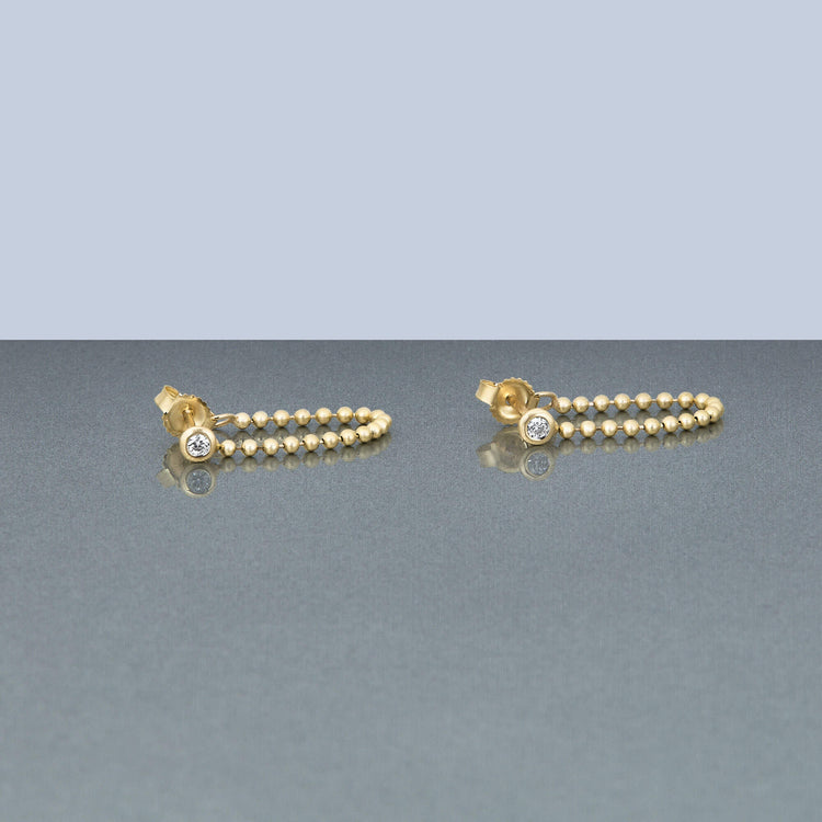 Stone and Strand 14K Yellow Gold Bedazzle Diamond Earrings Editorial Image