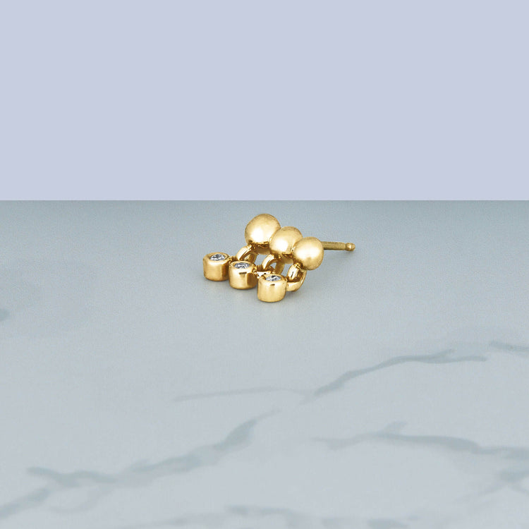 Stone and Strand 14K Yellow Gold Bedazzle Diamond Trio Stud Editorial Image