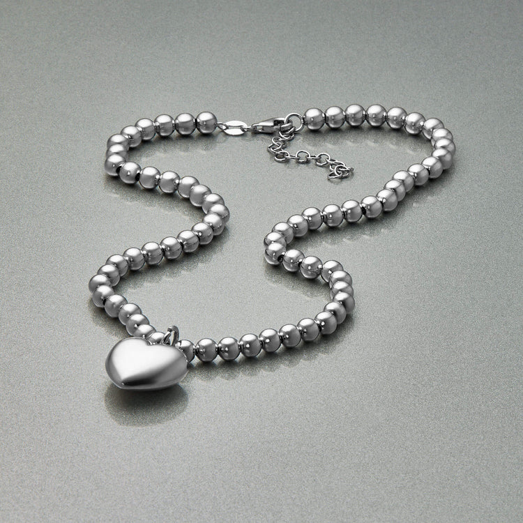 Stone and Strand Sterling Silver Big Hearted Puffed Necklace Editorial Image