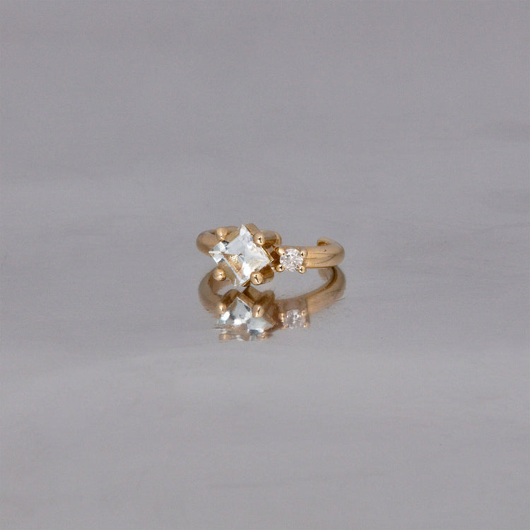 Stone and Strand 10K Yellow Gold Blue Lagoon Diamond and Aquamarine Ear Cuff Editorial Image