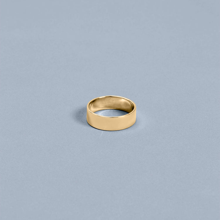 Stone and Strand 14K Yellow Gold Bold Cigar Band Editorial Image