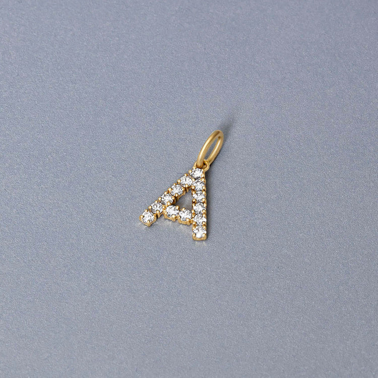 Stone and Strand 14K Yellow Gold Bold Diamond Initial Charm Editorial Image
