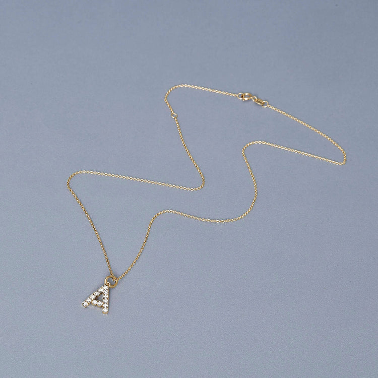 Stone and Strand 14K Yellow Gold Bold Diamond Initial Necklace Editorial Image