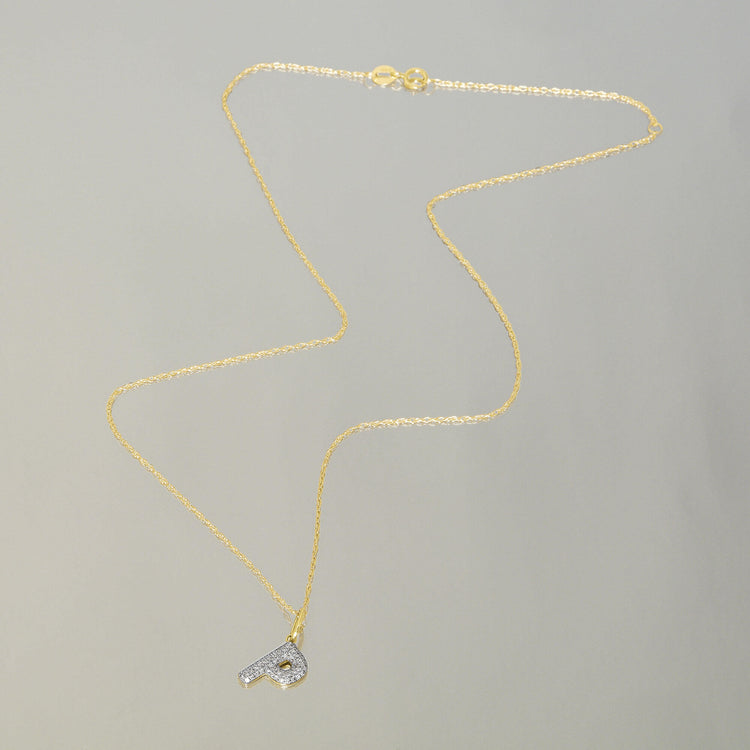 Stone and Strand 10K Yellow Gold Bubble Pave Initial Diamond Necklace Editorial Image