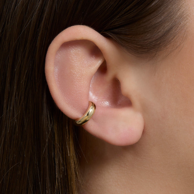 Image of 14K Yellow Gold Bold Puff Ear Cuff on Models Ear