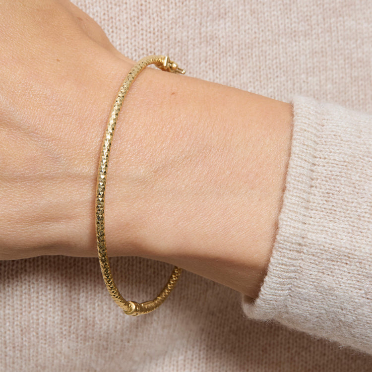 Image of 14K Yellow Gold Bold Sparkle Bracelet on Models Arm