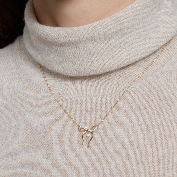 Image of 14K Yellow Gold Bow Nouveau Diamond Necklace on Models Neck