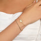 Image of 10K Yellow Gold Bow Nouveau Diamond ID Bracelet with Stone and Strand Bracelets