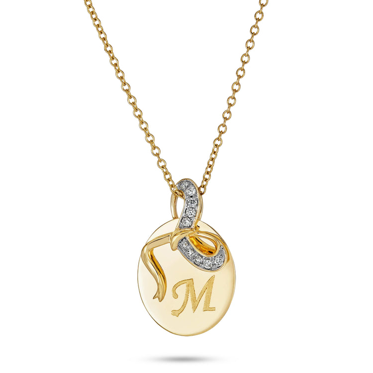 Stone and Strand 10K Yellow Gold Bow Nouveau Diamond Medallion Necklace Close Up Engraved Image