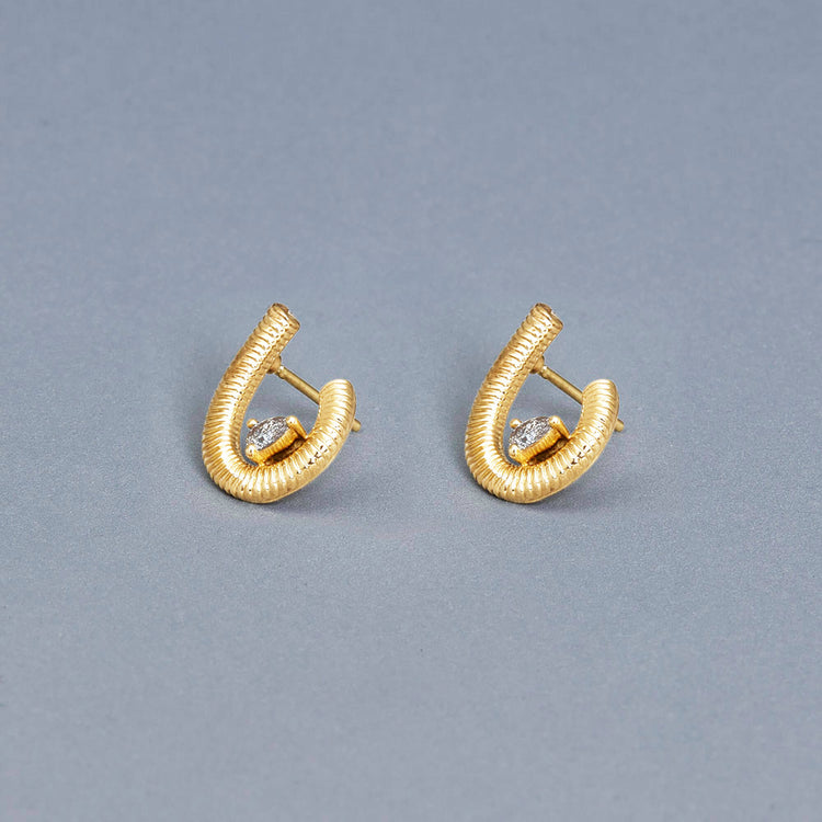 Stone and Strand 14K Yellow Gold Bowie Earrings Editorial Image