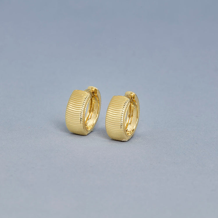 Stone and Strand 14K Yellow Gold Bowie Huggies Editorial Image