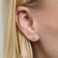 Image of 14K Yellow Gold Bright Lights Galactic Studs on Models Ear
