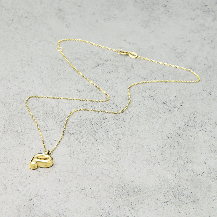 Stone and Strand 14K Yellow Gold Bubble Tea Initial Necklace P Initial Editorial Image