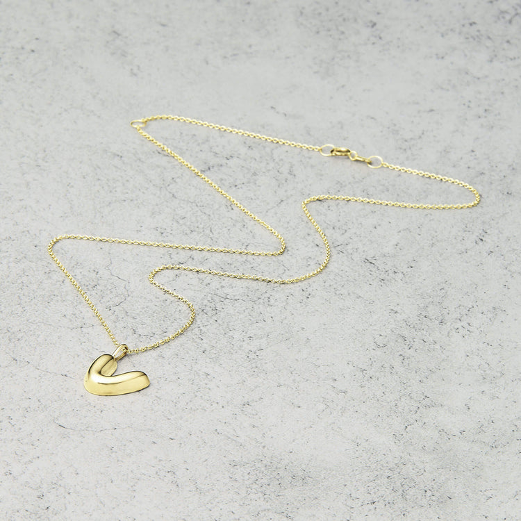 Stone and Strand 14K Yellow Gold Bubble Tea Initial Necklace V Initial Editorial Image