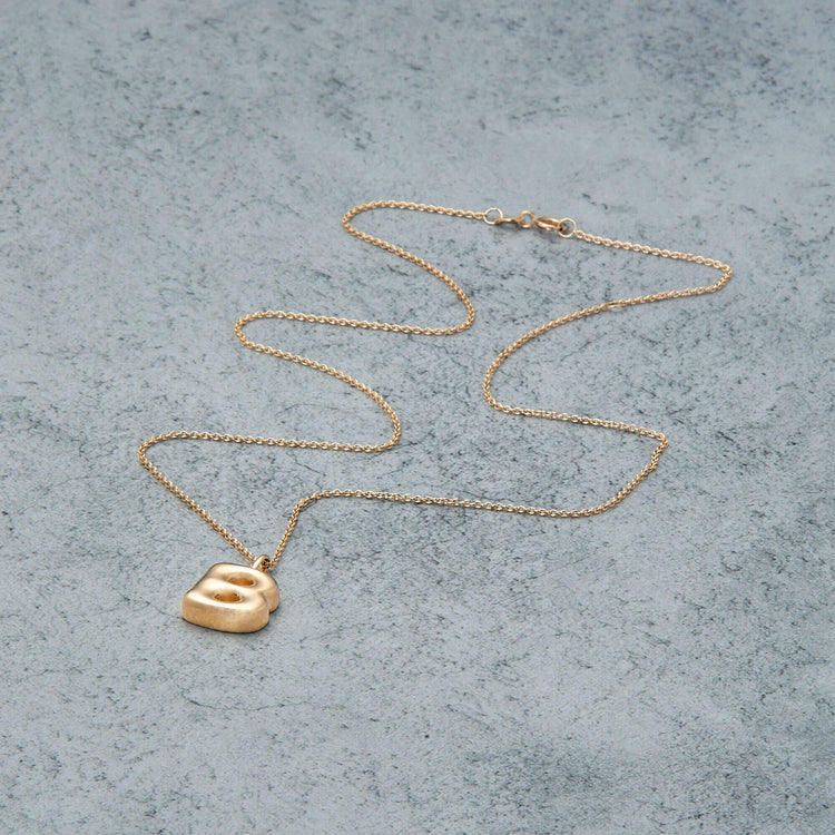 Stone and Strand 14K Yellow Gold Bubble Tea Initial Necklace B Initial Editorial Image