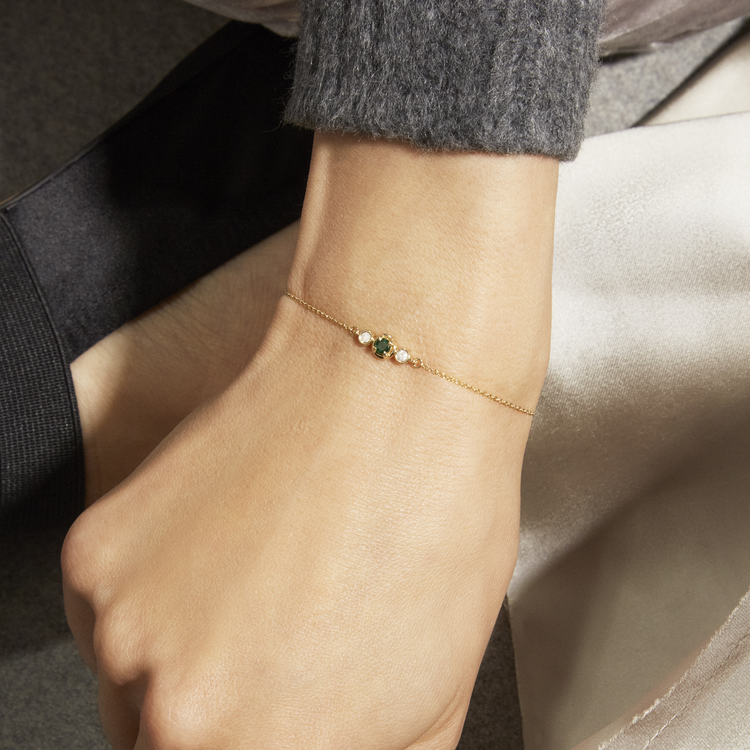 Image of 10K Yellow Gold Birthstone Diamond Bonbon Bracelet with Emerald on Models Arm