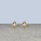 Stone and Strand 14K Yellow Gold Birthstone Pear Bonbon Studs with White Topaz Editorial Image