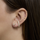 Image of Bold Pave Suspender On Models Ear with other Stone And Strand Earrings