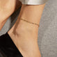 Image of 10K Yellow Gold Chained to My Heart Anklet on Models Ankle