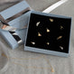 Still life image of Gothic Pave Initial Charm with Stone and Strand solid gold jewelry