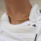 Image of 14K Yellow Gold Classic Rolo Anklet on Models Ankle