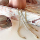 Still Life Image of 14K Yellow Gold Classic Rolo Anklet with Stone and Strand Anklets