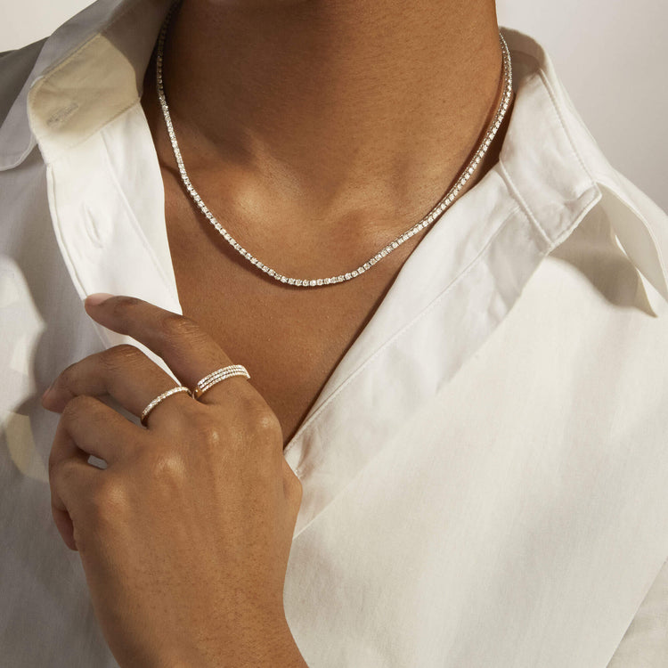 Image of 14K White Gold Unflippable Tennis Necklace In White Gold on Models Neck