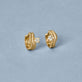 Stone and Strand 14K Yellow Gold Cobra Wave Double Ear Huggies Editorial Image