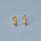 Stone and Strand 10K Yellow Gold Come Closer Diamond Mini Huggies Editorial Image