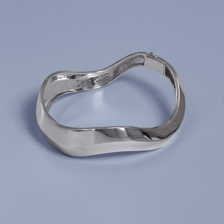 Stone and Strand Sterling Silver Contour Knife Edge Stacking Bangle Editorial Image