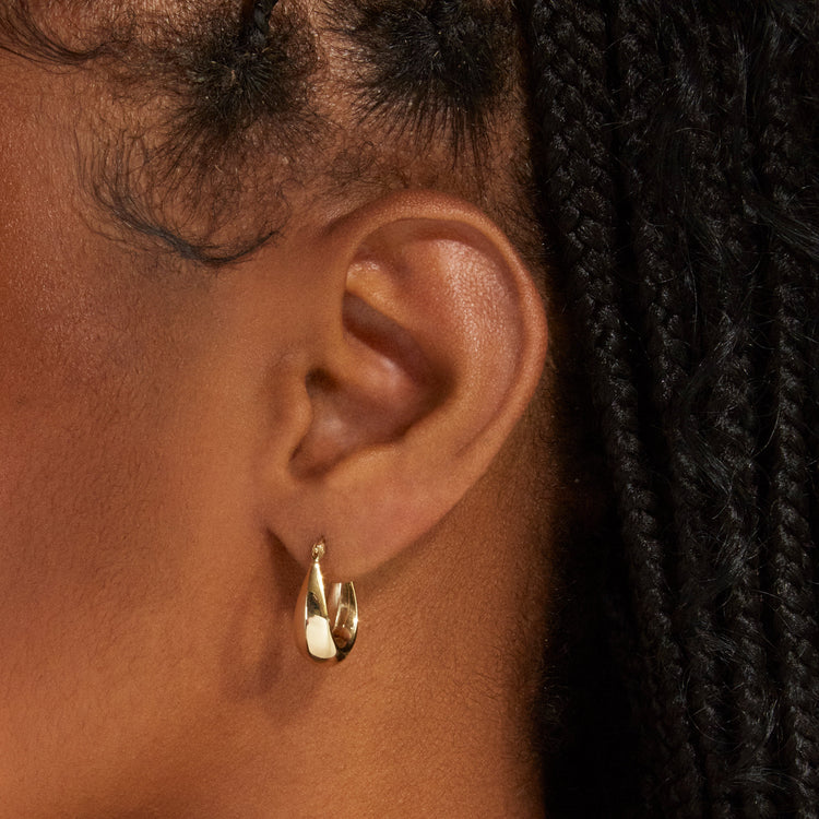 Image of 14K Yellow Gold Curvilinear Hoops on Models Ear