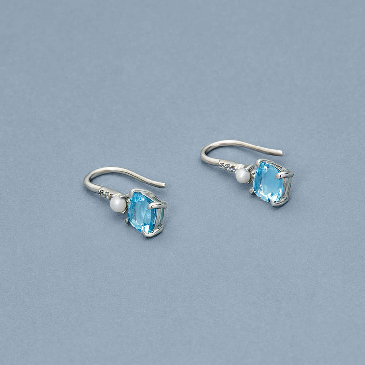 Stone and Strand 14K White Gold Cushion Cut Aquamarine and Pearl Drop Earrings Editorial Image