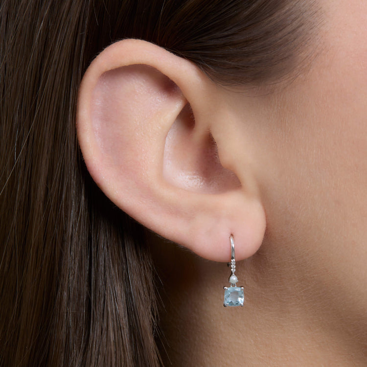Image of 14K White Gold Cushion Cut Aquamarine and Pearl Drop Earrings on Models Ear