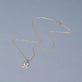 Stone and Strand 14K Yellow Gold  Custom Love Note Diamond Necklace Editorial Image