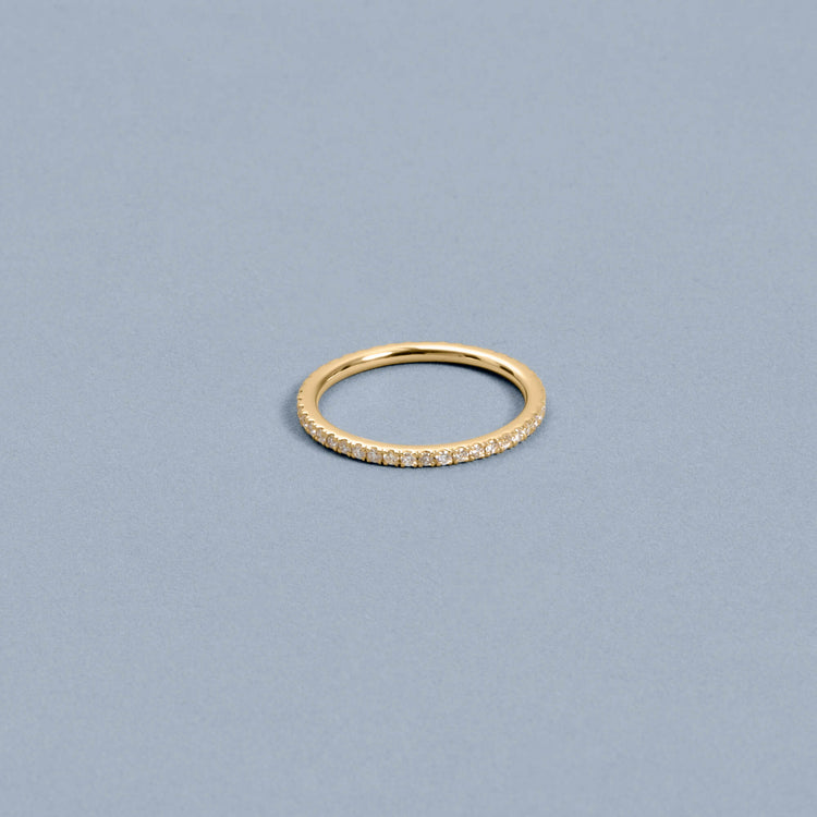 Stone and Strand 14K Yellow Gold Classic Diamond Eternity Ring Editorial Image