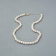 Stone and Strand 14K Yellow Gold Daily Pearl Choker Editorial Image