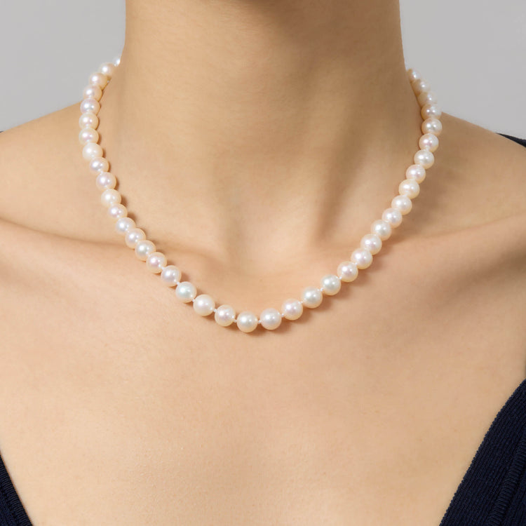 Image of 14K Yellow Gold Daily Pearl Choker on Models Neck
