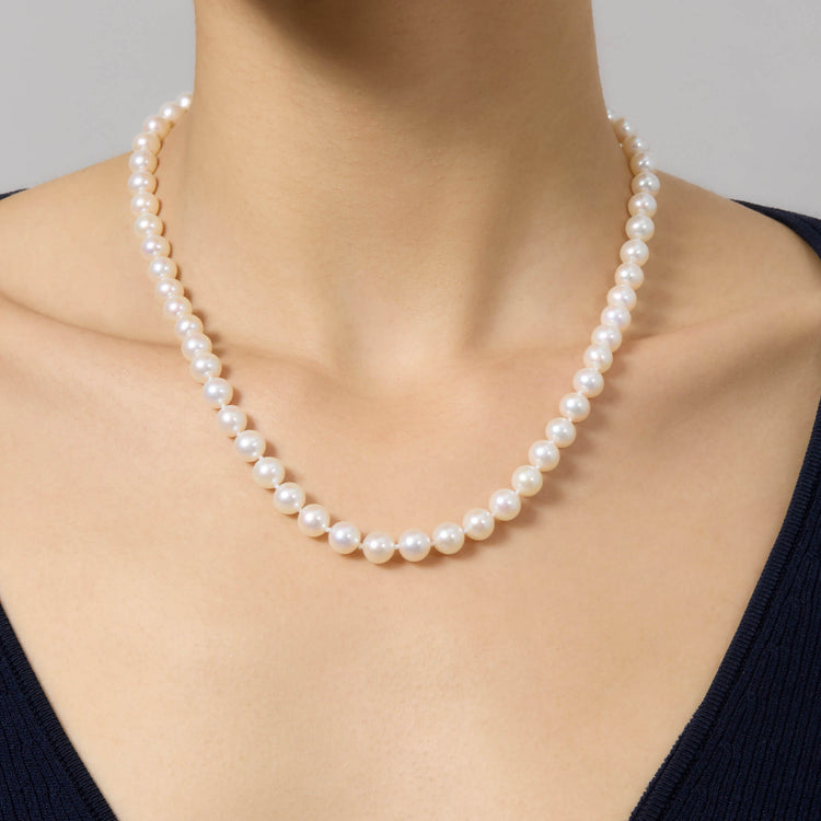 Image of 14K Yellow Gold Daily Pearl Necklace on Models Neck