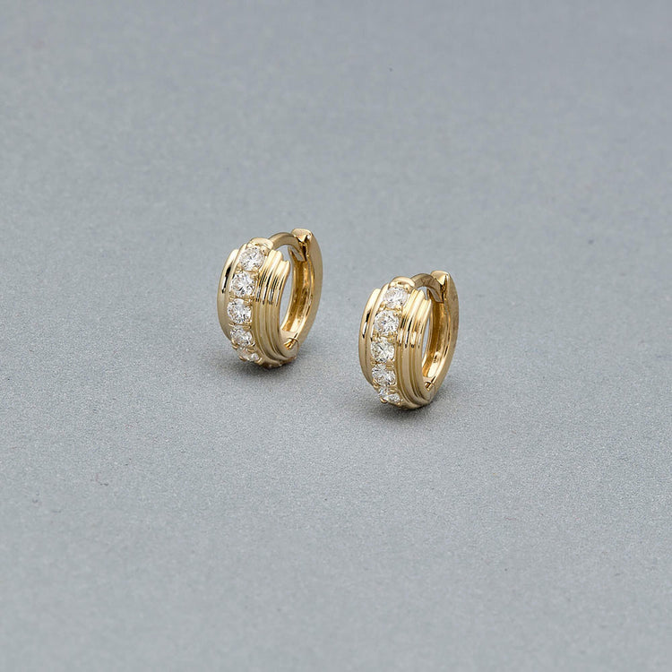 Stone and Strand 14K Yellow Gold Dainty Boulevard Huggies Editorial Image