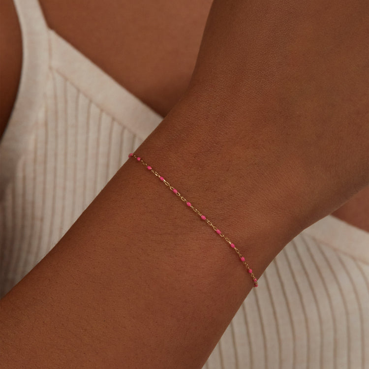 Image of 10K Yellow Gold Pink Dainty Goldie Pop Bracelet on Models Arm